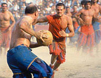 calcio storico combatants tussle over the ball